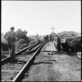 Completing repairs on the railway bridge over Victoria Street, Waihī, after it was struck by a road crane.