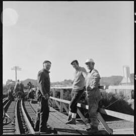 Completing repairs on the railway bridge over Victoria Street, Waihī, after it was struck by a road crane.