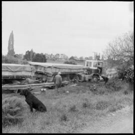 NZ Lumber truck and trailer collides with barrier.