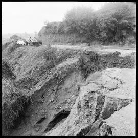Different angles on the washout on Upper Pāpāmoa Road resulting from the previous week's storm.