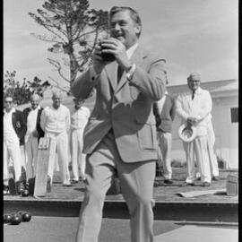 Bowls. Mayor Mr R. A. Owens sends down the first bowl of the season.