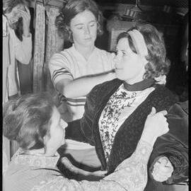 Fitting a costume on Neila Taylor