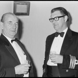 T. R. P. Crawford and Commander B. Tuson