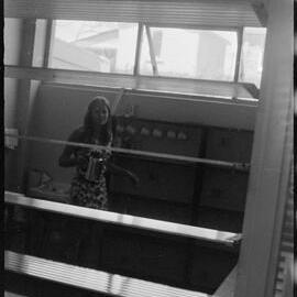 Photograph of woman in room