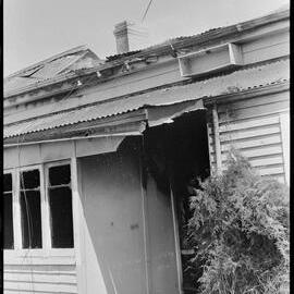 Firefighters outside Chevron Guest House in First Ave