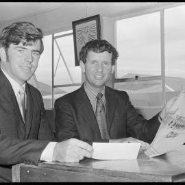 Mr J. D. Patterson hands cheque to Mr P. D. Clark