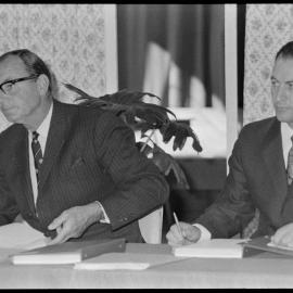 Men in suits at meeting