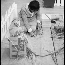 Girl weaving with flax - Hobbies Exhibition