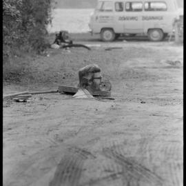 Mr Bryan Neal of Tauranga inspecting sewage system