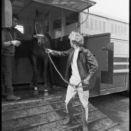 Jockey Kevin Scott unloading an unamed colt