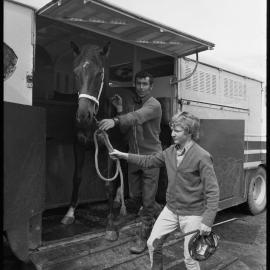 Jockey Kevin Scott unloading an unamed colt
