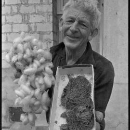 Mr Des Smith with his silkworms