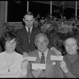 City round table presents cheques