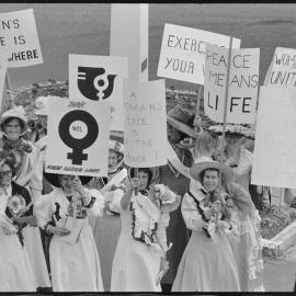 Parade commemorates womens vote anniversary