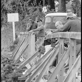 Workers repair wooden overbridge 