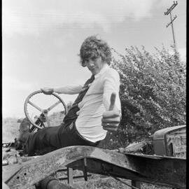 Unidentified man on old machinery