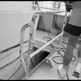 Repairing trawler fishing net