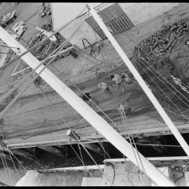 Repairing trawler fishing net