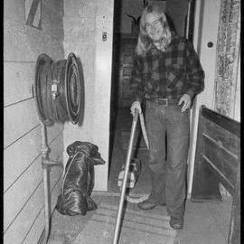 Nigel Sparrow doing his cleaning duty at the Tauranga Youth Hostel.