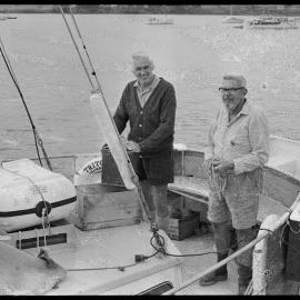 Brian Blackie and Frank Gresham cleaning up the MS Triton after accompanying the Auckland to Suva yacht race fleet.