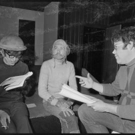 Actors studying lines for the Gateway Theatre's forthcoming production of "Biggles".