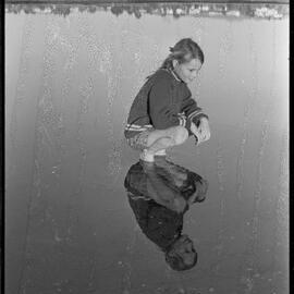 Fiona Mackenzie of Rotorua reflected in the waters of the Waimapu Estuary.