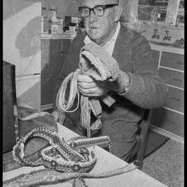 Mr Jim Parkes with some examples of his macrame work.