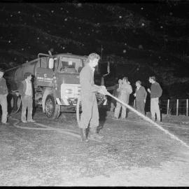 Clearing tallow off the Tauranga-Hamilton highway near Barkes Corner.