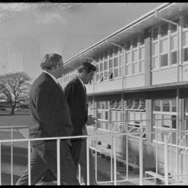 Prime Minister Norman Kirk with (principal Mr N. D. Morris?) during a visit to Tauranga Boys' College.