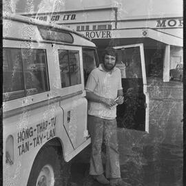 Mr R. J. McKerron with a Land Rover being shipped from Mount Maunganui to Vietnam for the Red Cross.