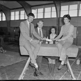 Mount Maunganui Lions present a cheque to the Mount Maunganui Gymnastics Club to pay for the Olympic pommel horse.