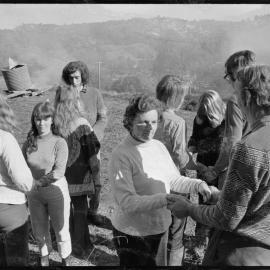 Workers on The Farm at Tamata a Taihuka take a break for a touch therapy session.