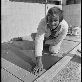 Retiling the Mount Hot Pools.