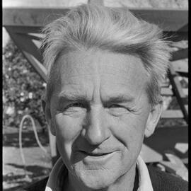 Captain Len Anderson building a half-size replica of the Tauranga scow Alma in his backyard.