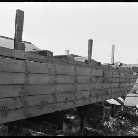 Captain Len Anderson building a half-size replica of the Tauranga scow Alma in his backyard.