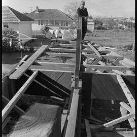 Captain Len Anderson building a half-size replica of the Tauranga scow Alma in his backyard.