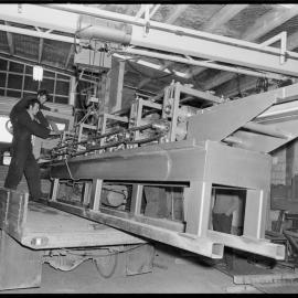 Unloading a locally-made profile flat roofing machine at G. W. Taylor Ltd.