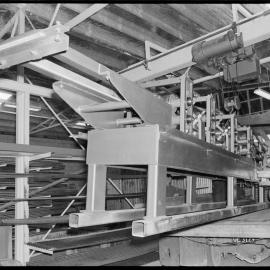 Unloading a locally-made profile flat roofing machine at G. W. Taylor Ltd.