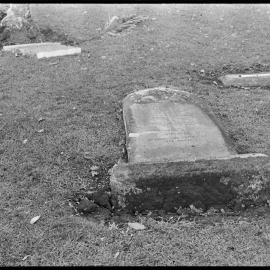 Vandalised headstones at the Mission Cemetery.