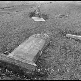 Vandalised headstones at the Mission Cemetery.