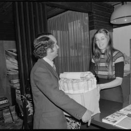 Lorraine Oliver, receptionist at Tauranga Public Relations Office, and Peter Clark, public relations officer, posting newspapers to Britain.