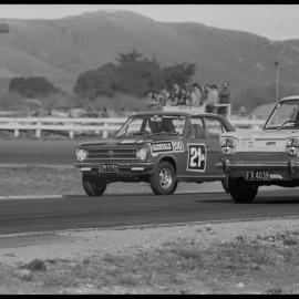 Motor racing. Datsun and Simca participating in the Glenvale 200 production car race at Bay Park on Sunday.