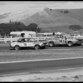 Motor racing. Torana XU1 and Charger E49 participating in the Glenvale 200 production car race at Bay Park on Sunday.