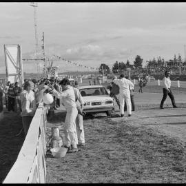 Motor racing. Datsun at a refueling stop in the Glenvale 200 production car race at Bay Park on Sunday.