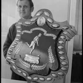 Rugby. Mr Brian McCord holding the Te Hurinui Apanui Shield.