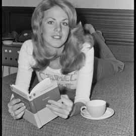 Miss New Zealand Pamela King studying German while in Tauranga.