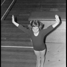 Terrelle Bradbury completing a jump over the "horse" at a Western Bay gymnastics competition.