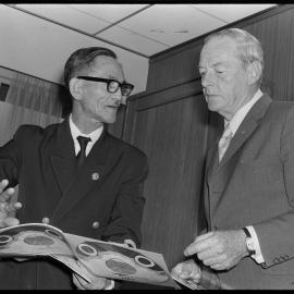 Captain K. Ogata presenting a gift from the city of Shimonoseki to Tauranga city, represented by Deputy-mayor E. L Faulkner.