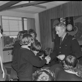 Tauranga Boys' College students being congratulated after taking part in a police service syllabus as part of their Duke of Edinburgh Award Scheme's service section.