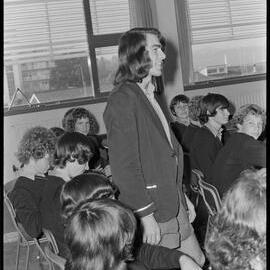 A Tauranga Boys' College student being congratulated after taking part in a police service syllabus as part of their Duke of Edinburgh Award Scheme's service section.